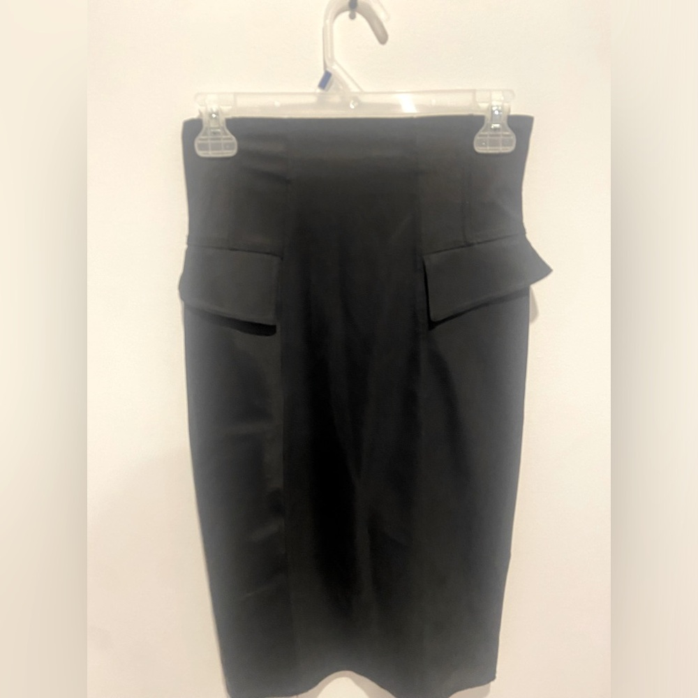 Long black skirt from AMZ. Zipper all the way down the back, with two pockets.